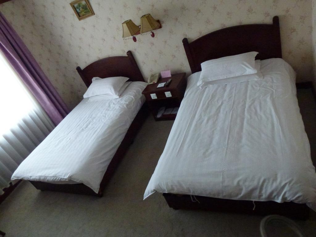 Hotel Harbin Volgamanor à Acheng Chambre photo