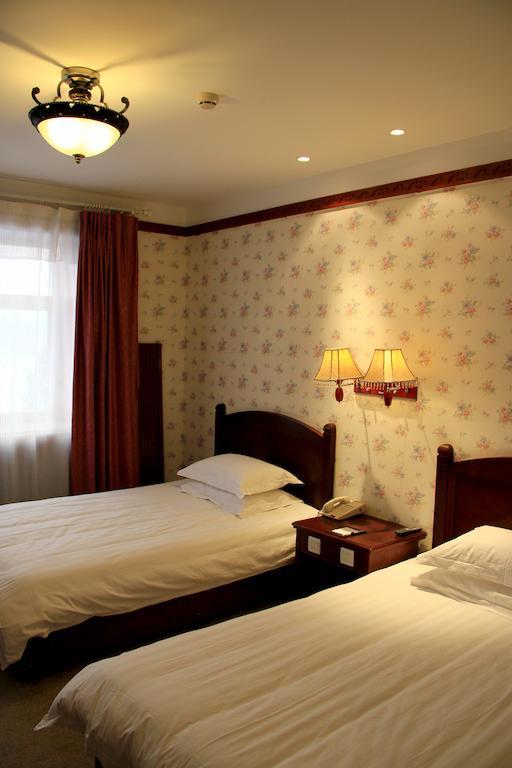 Hotel Harbin Volgamanor à Acheng Chambre photo